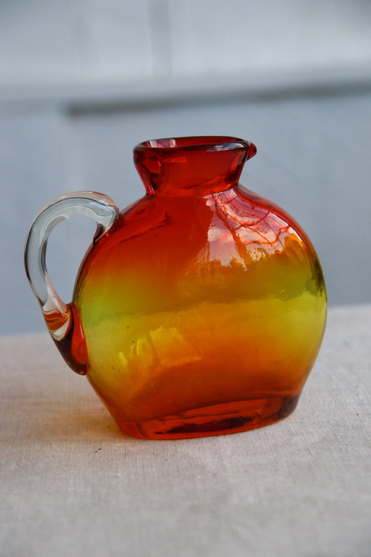 Hand Blown red and orange vase with handle