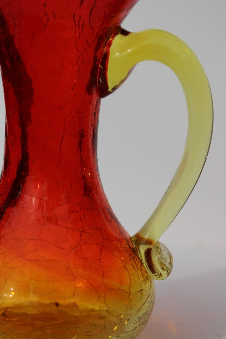 Crackle red and orange vase with handle