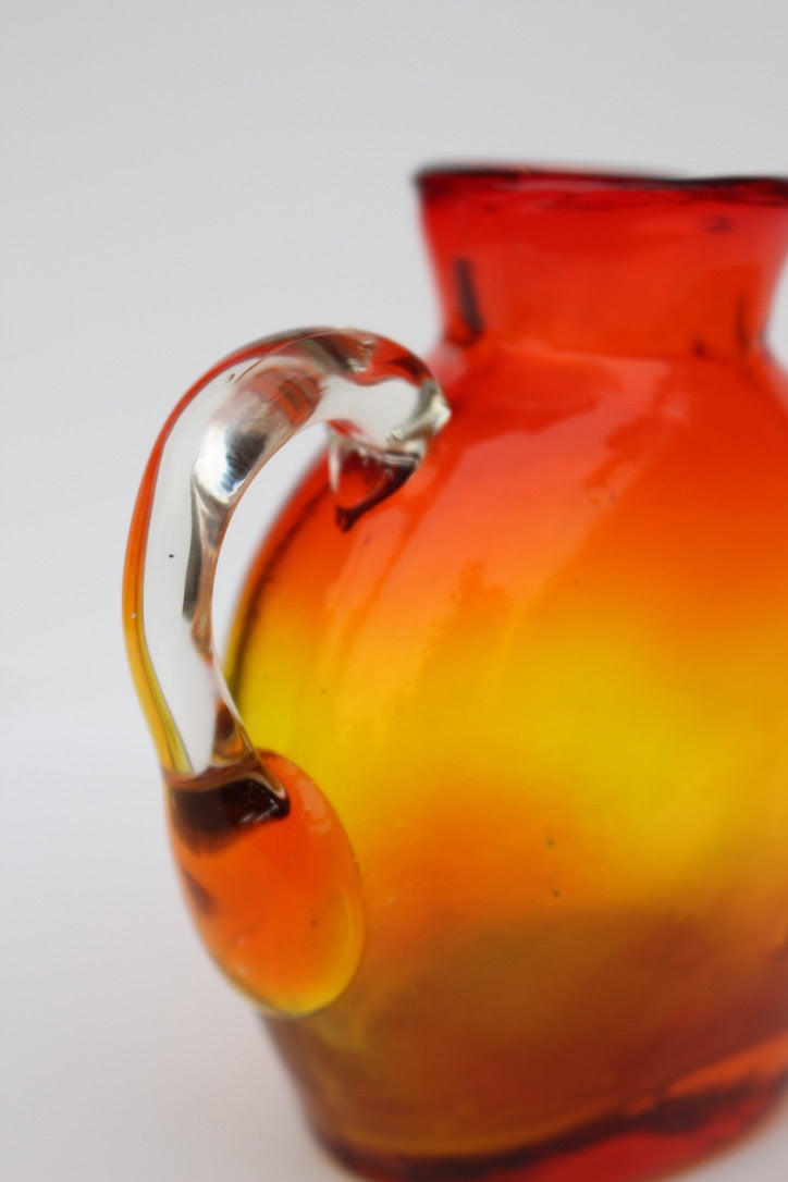 Hand Blown red and orange vase with handle
