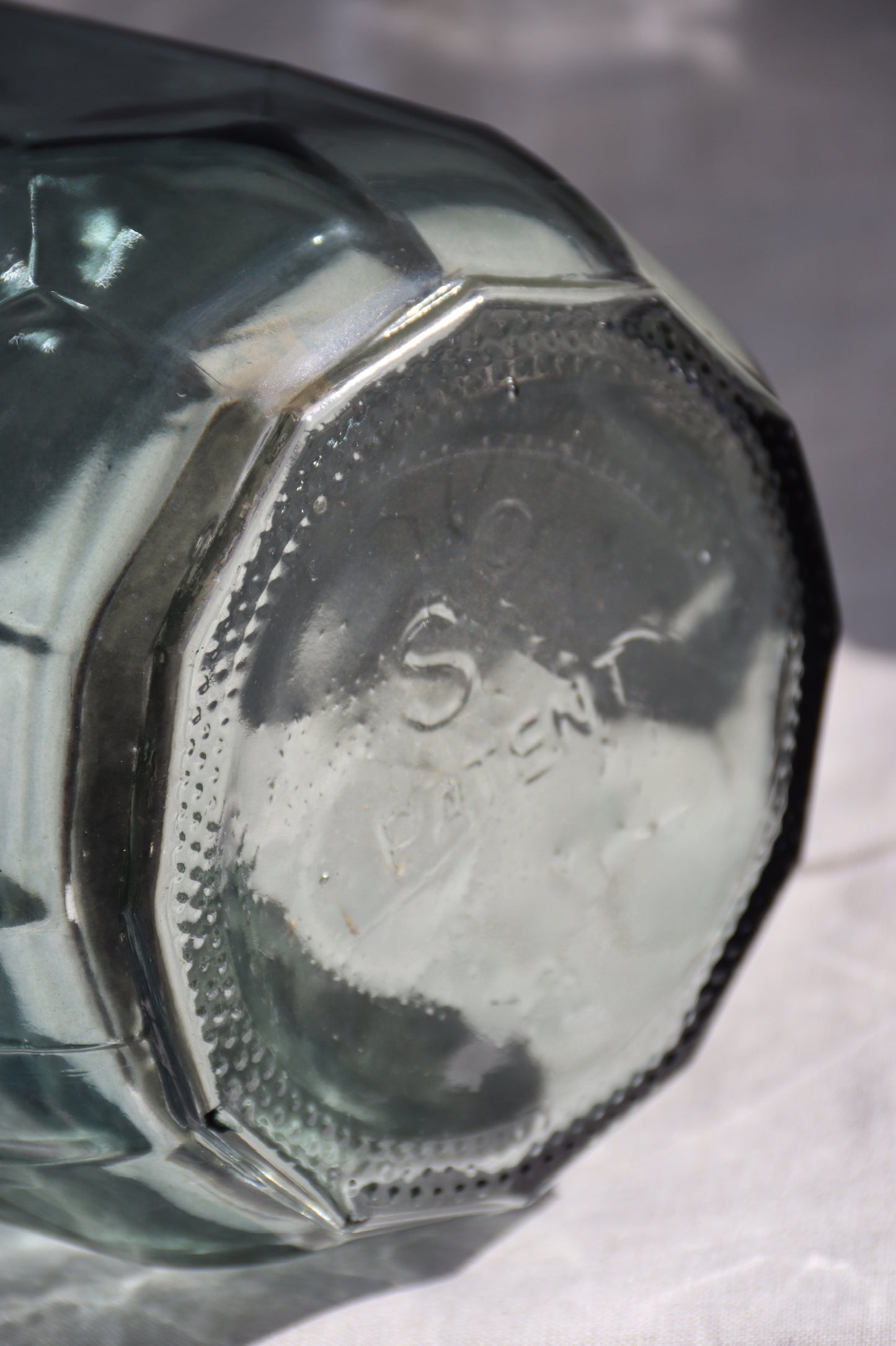 Large Faceted Glass Bottle
