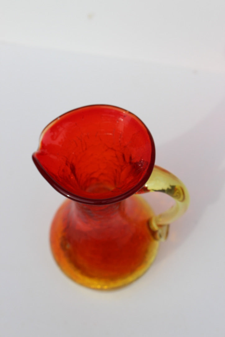 Crackle red and orange vase with handle