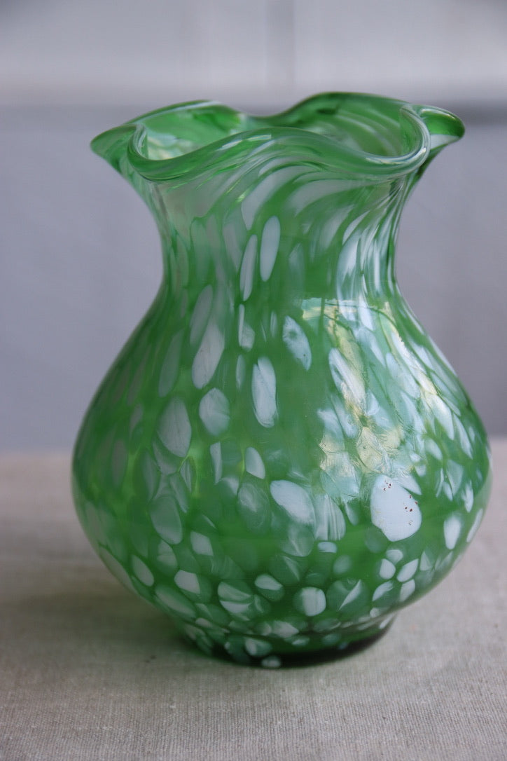 Green with white spatter glass hand blown vase with wavy rim