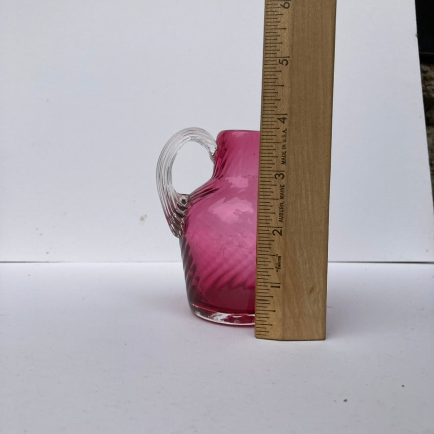 Mini hand blown maroon glass pitcher/vase