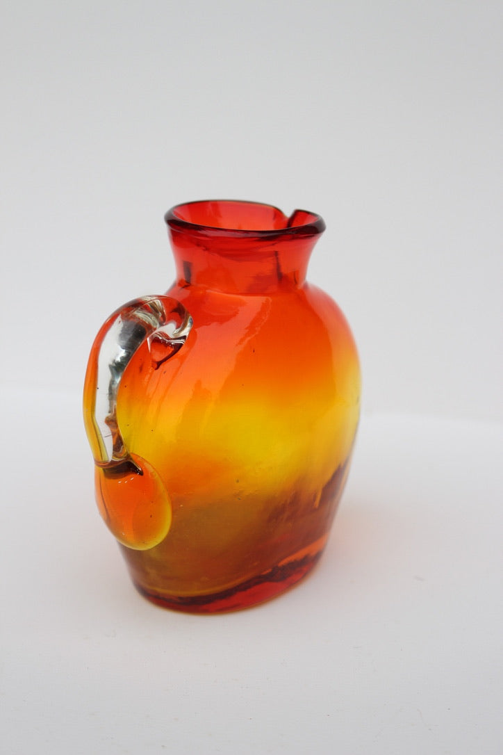 Hand Blown red and orange vase with handle