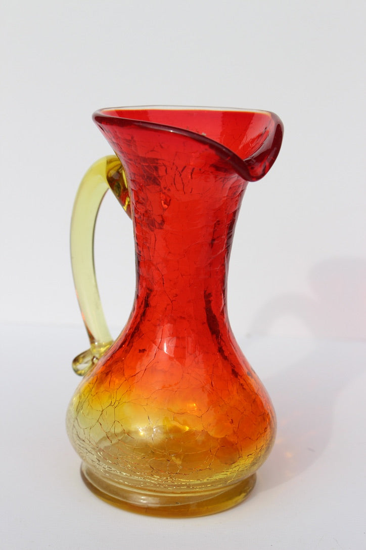 Crackle red and orange vase with handle