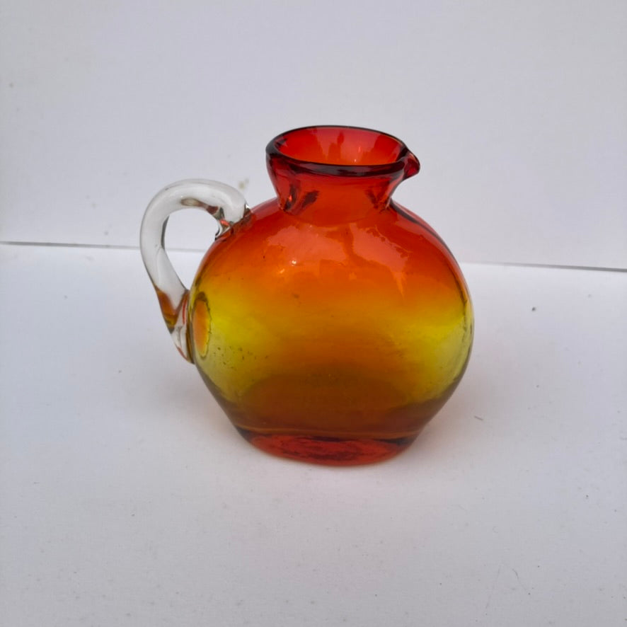 Hand Blown red and orange vase with handle