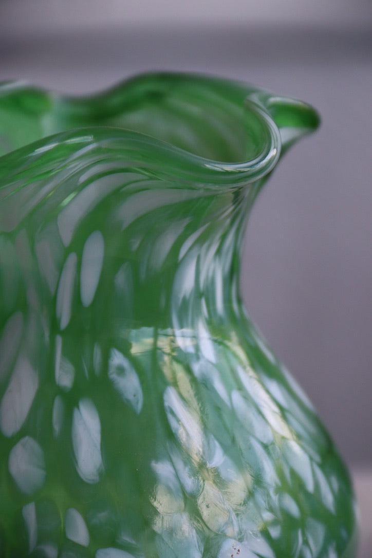 Green with white spatter glass hand blown vase with wavy rim