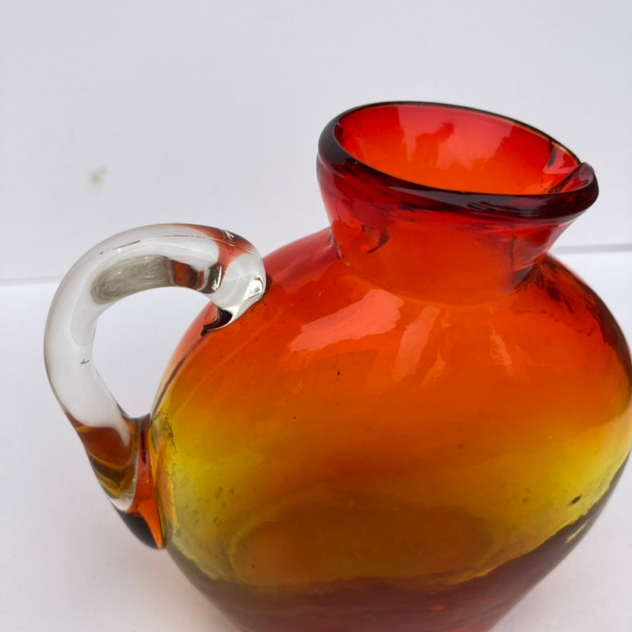 Hand Blown red and orange vase with handle