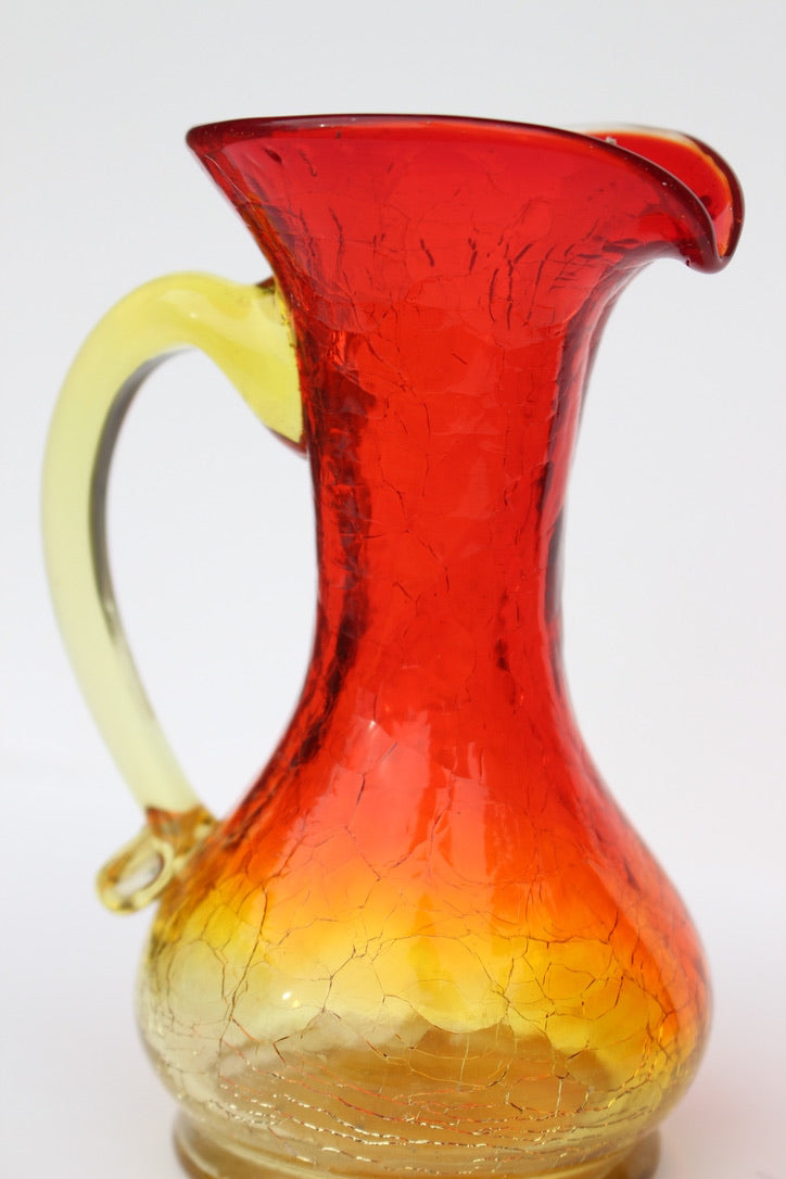 Crackle red and orange vase with handle