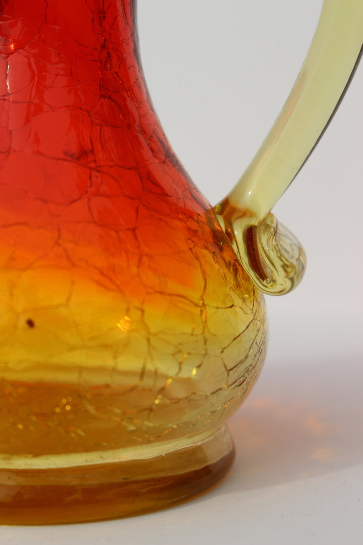 Crackle red and orange vase with handle