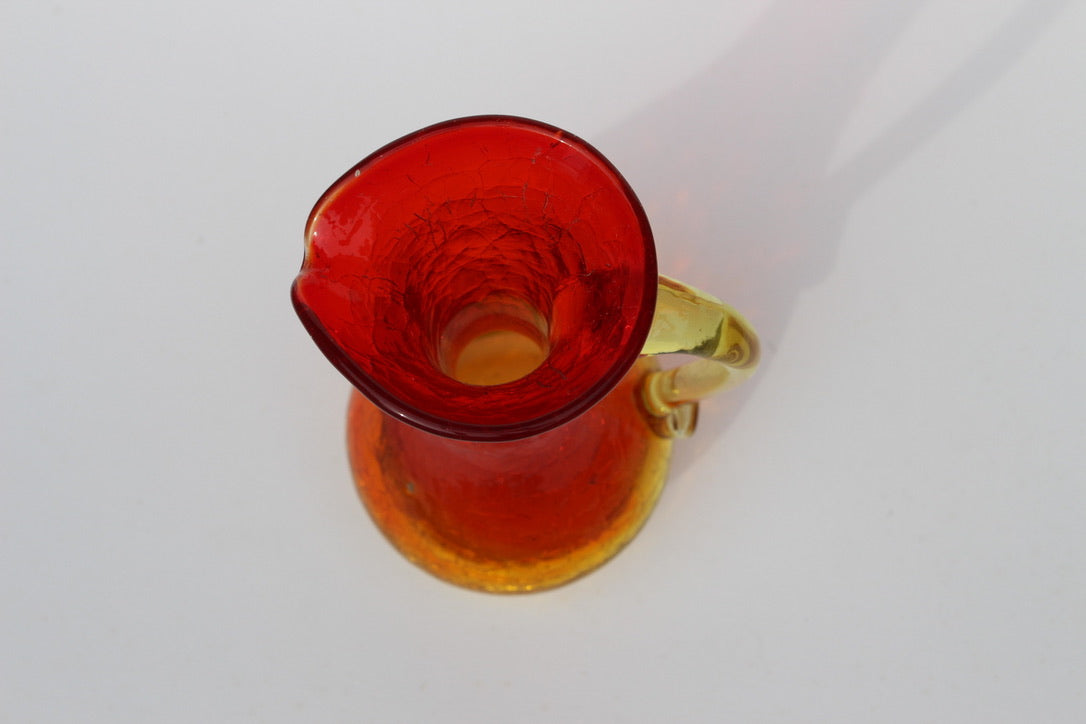 Crackle red and orange vase with handle