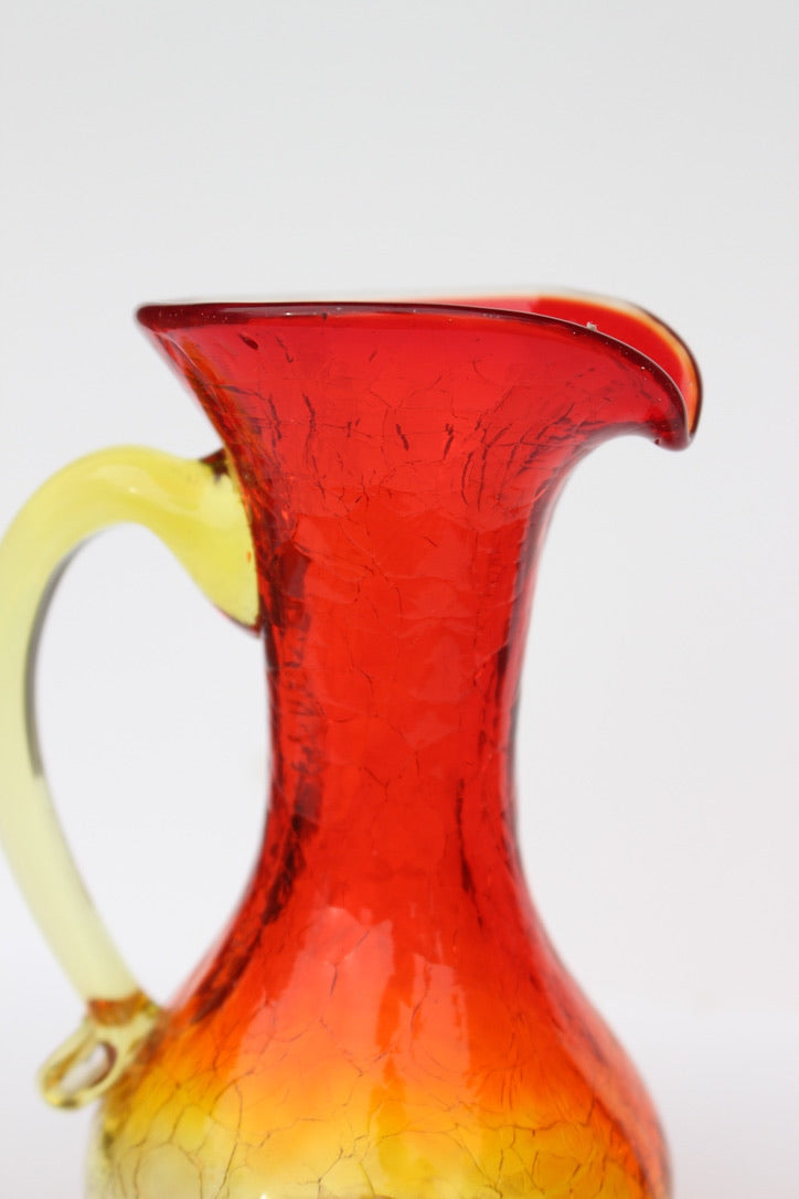 Crackle red and orange vase with handle