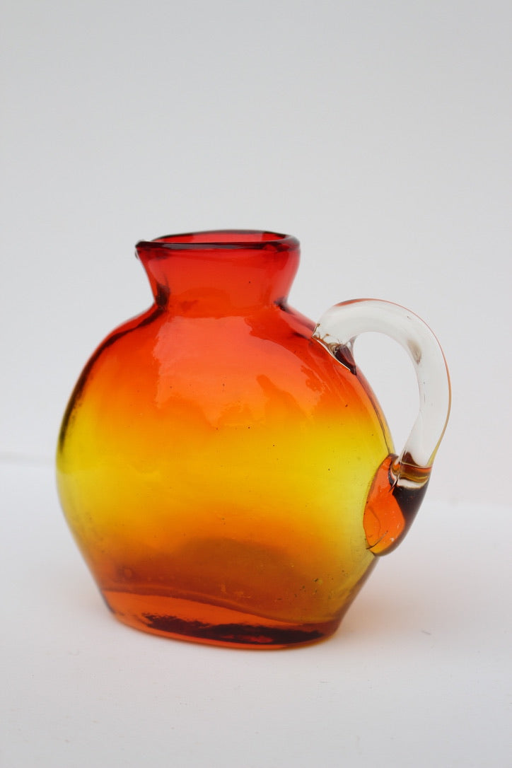 Hand Blown red and orange vase with handle