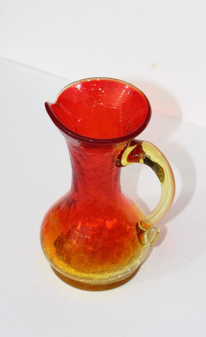 Crackle red and orange vase with handle