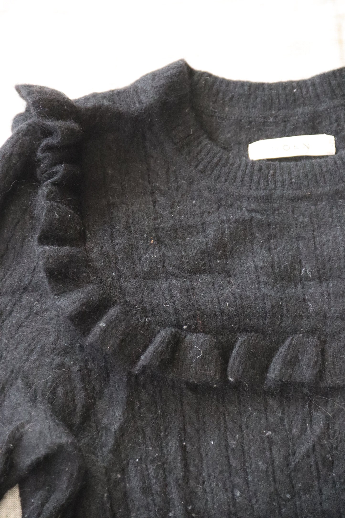 Doen Black Ruffled Sweater