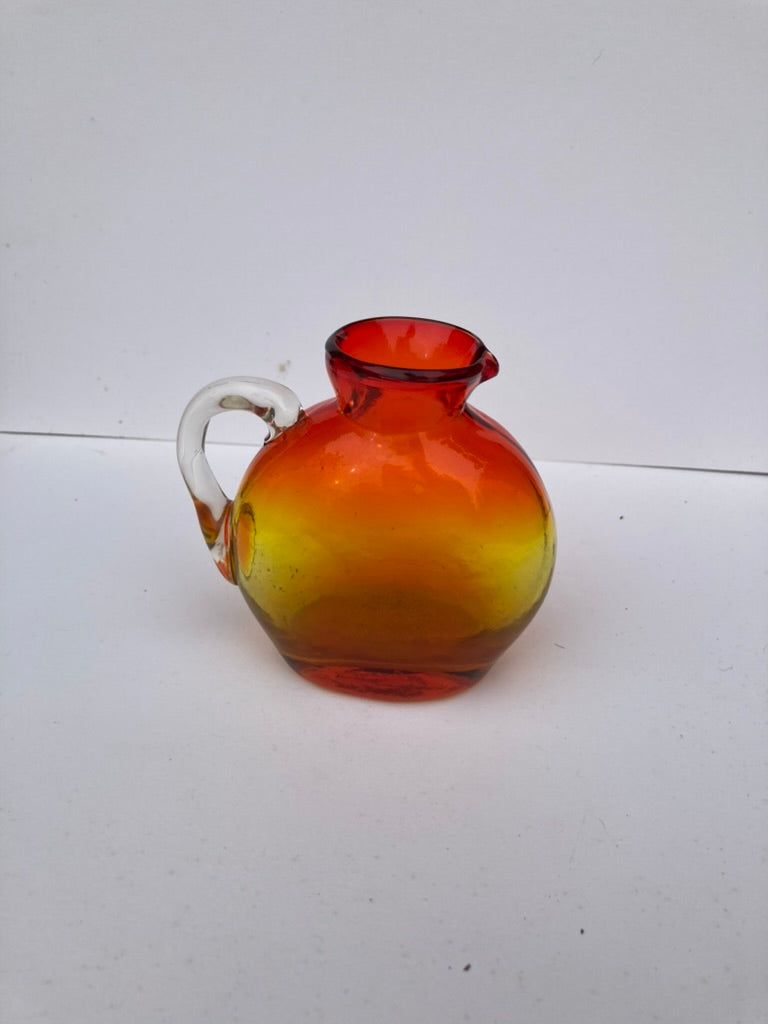 Hand Blown red and orange vase with handle