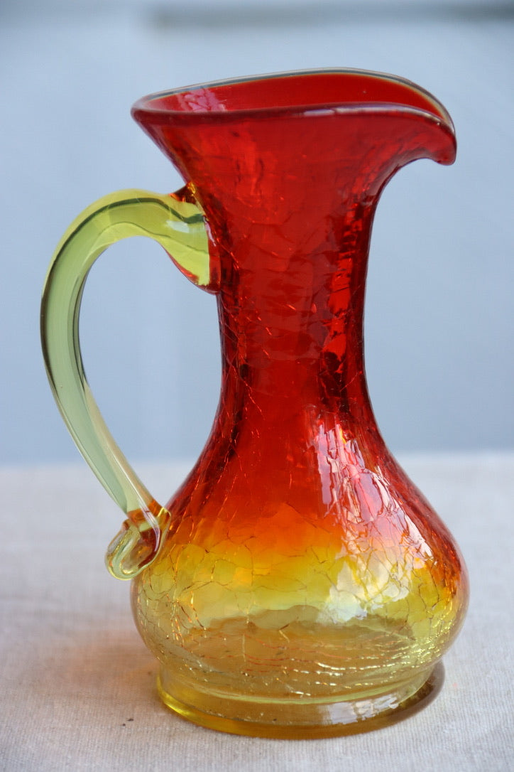 Crackle red and orange vase with handle