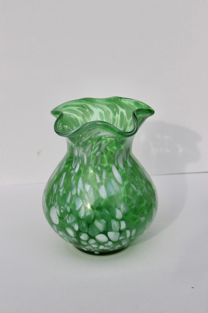 Green with white spatter glass hand blown vase with wavy rim