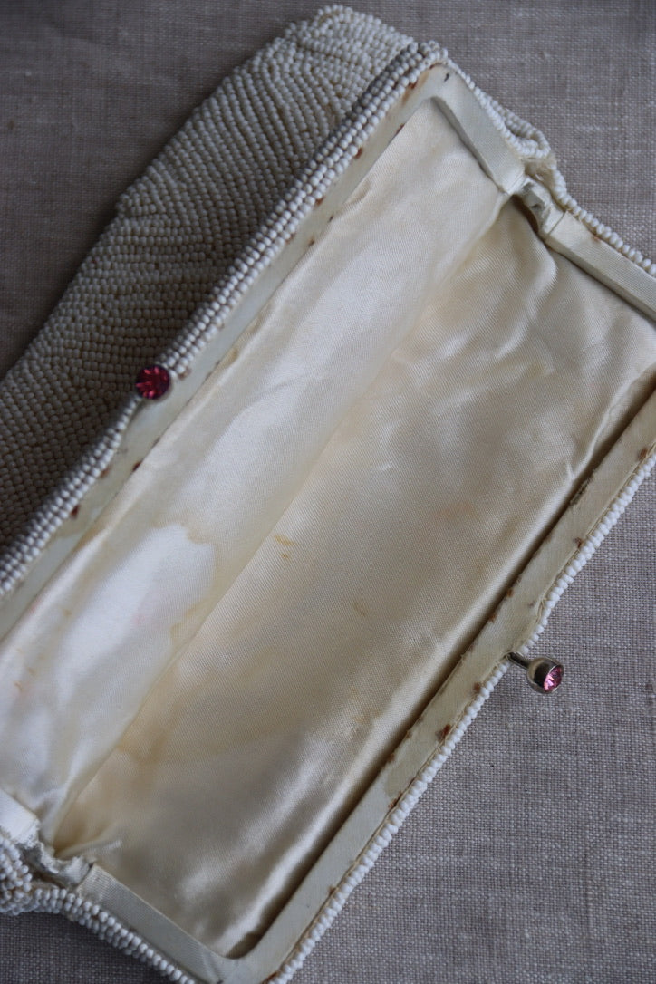 White Beaded Kisslock Clutch with Pink Rhinestones