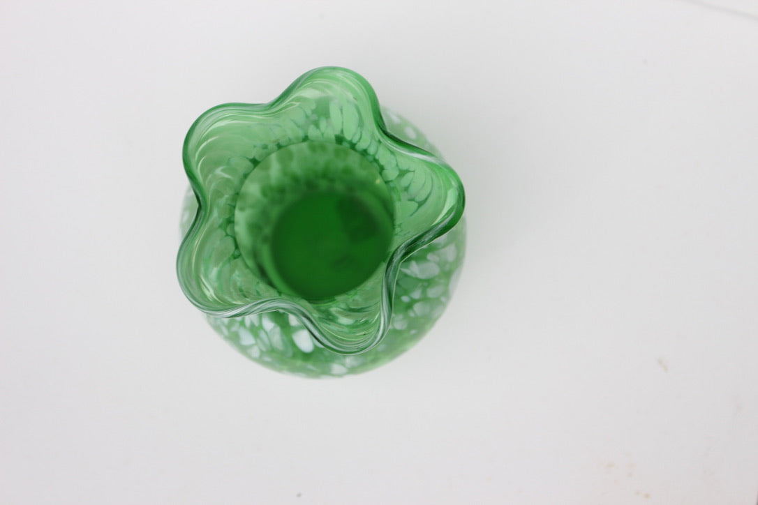 Green with white spatter glass hand blown vase with wavy rim