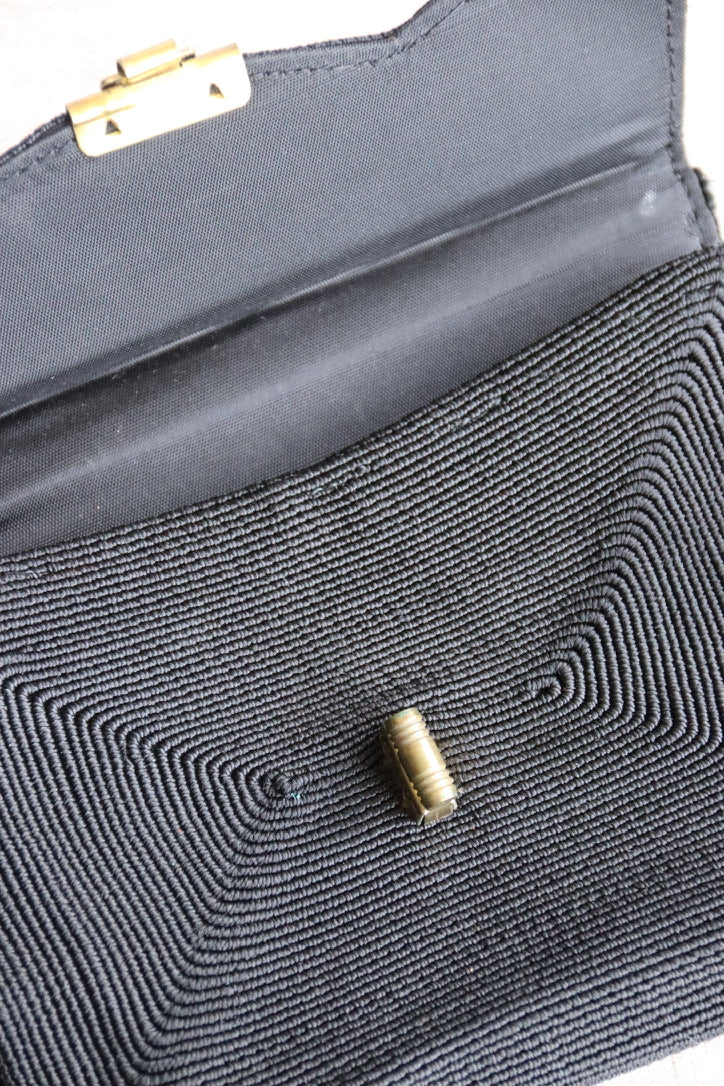 Black Woven Coil Clutch Bag