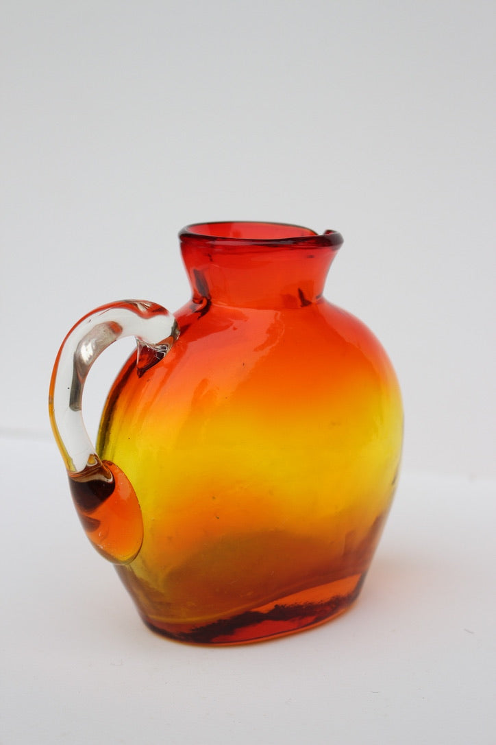 Hand Blown red and orange vase with handle