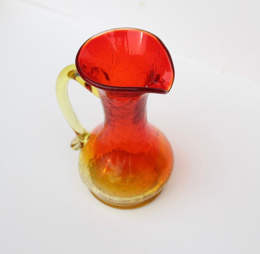 Crackle red and orange vase with handle