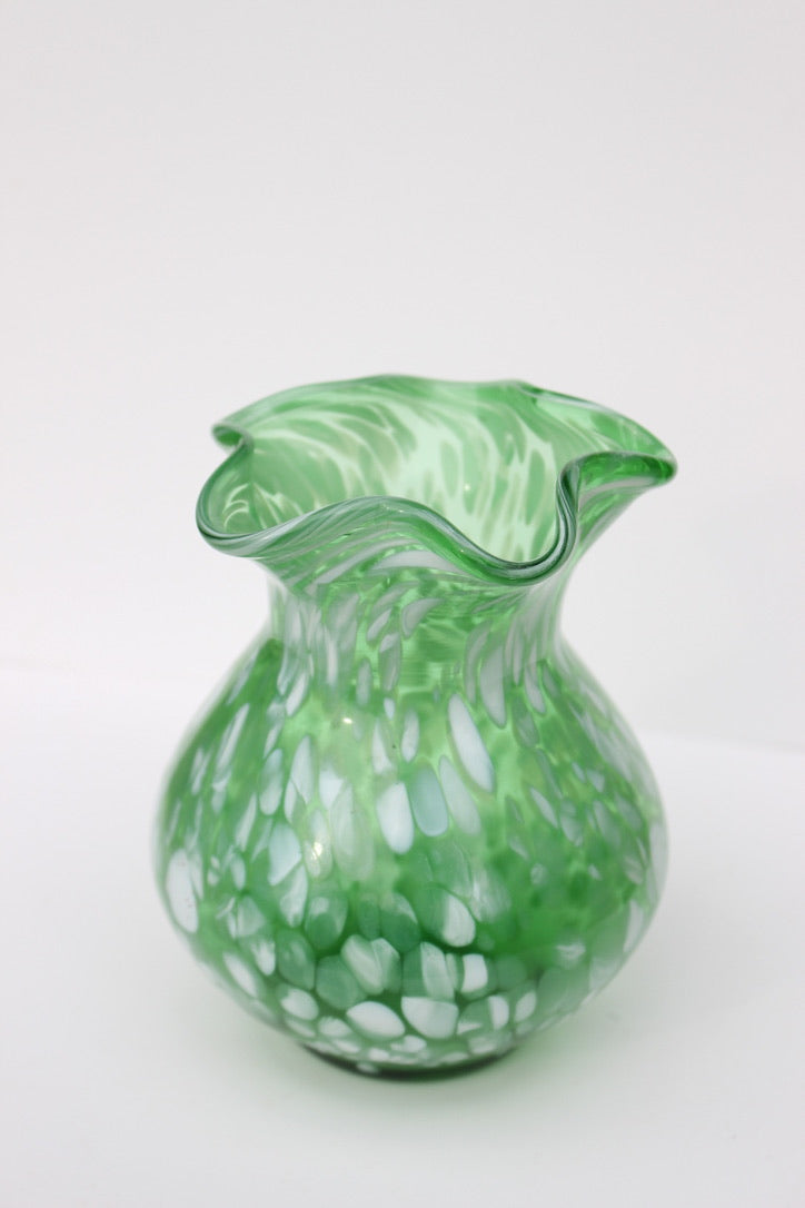 Green with white spatter glass hand blown vase with wavy rim