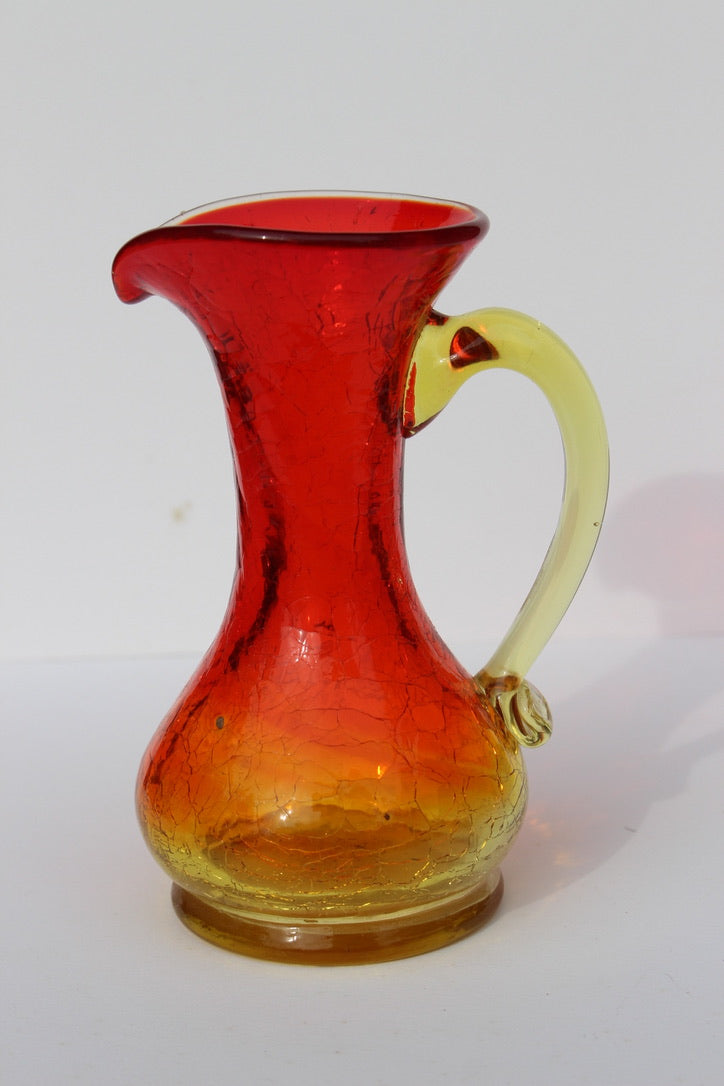 Crackle red and orange vase with handle