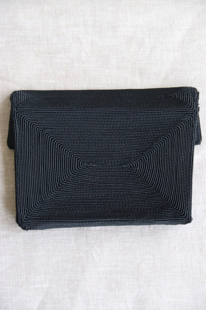 Black Woven Coil Clutch Bag