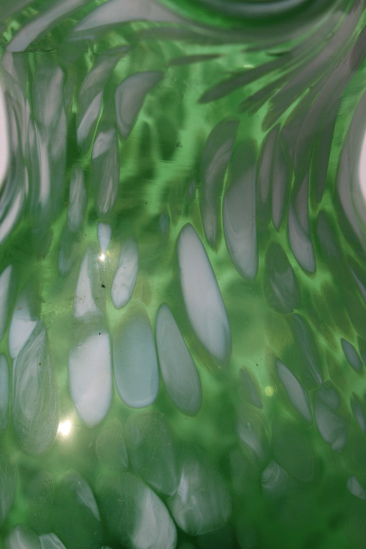 Green with white spatter glass hand blown vase with wavy rim