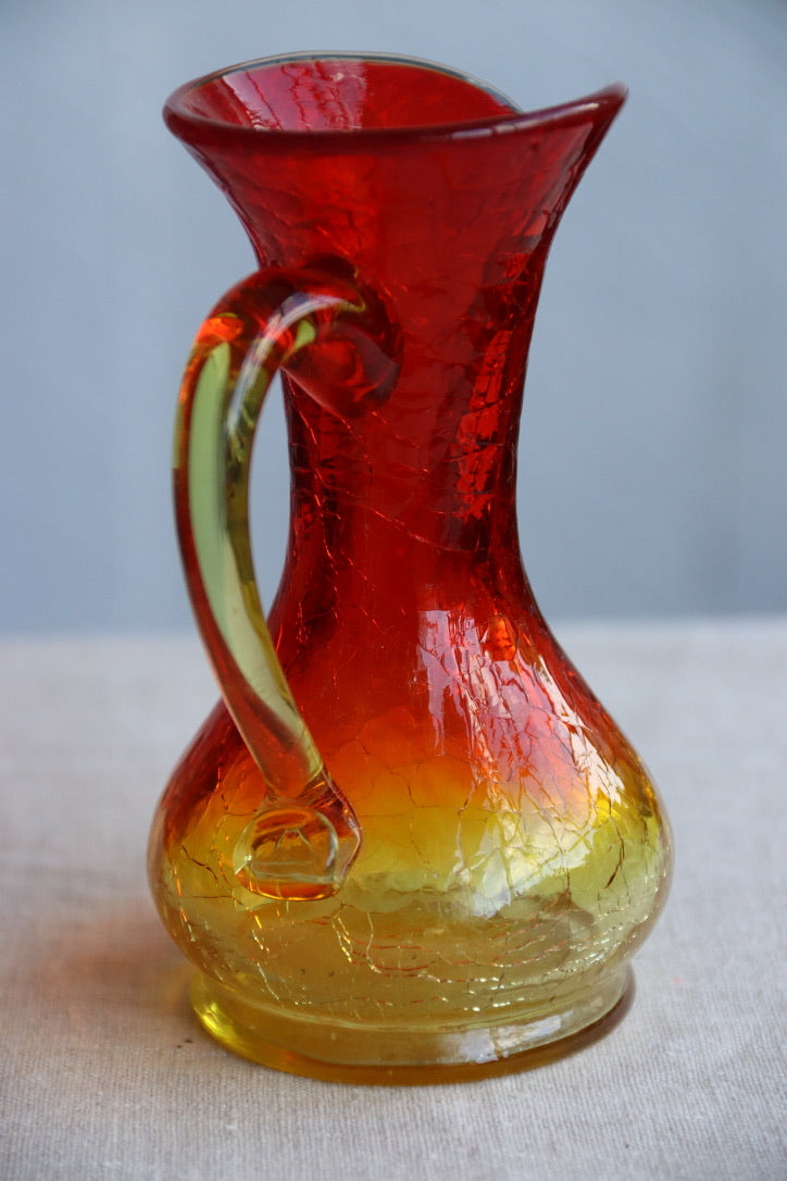 Crackle red and orange vase with handle