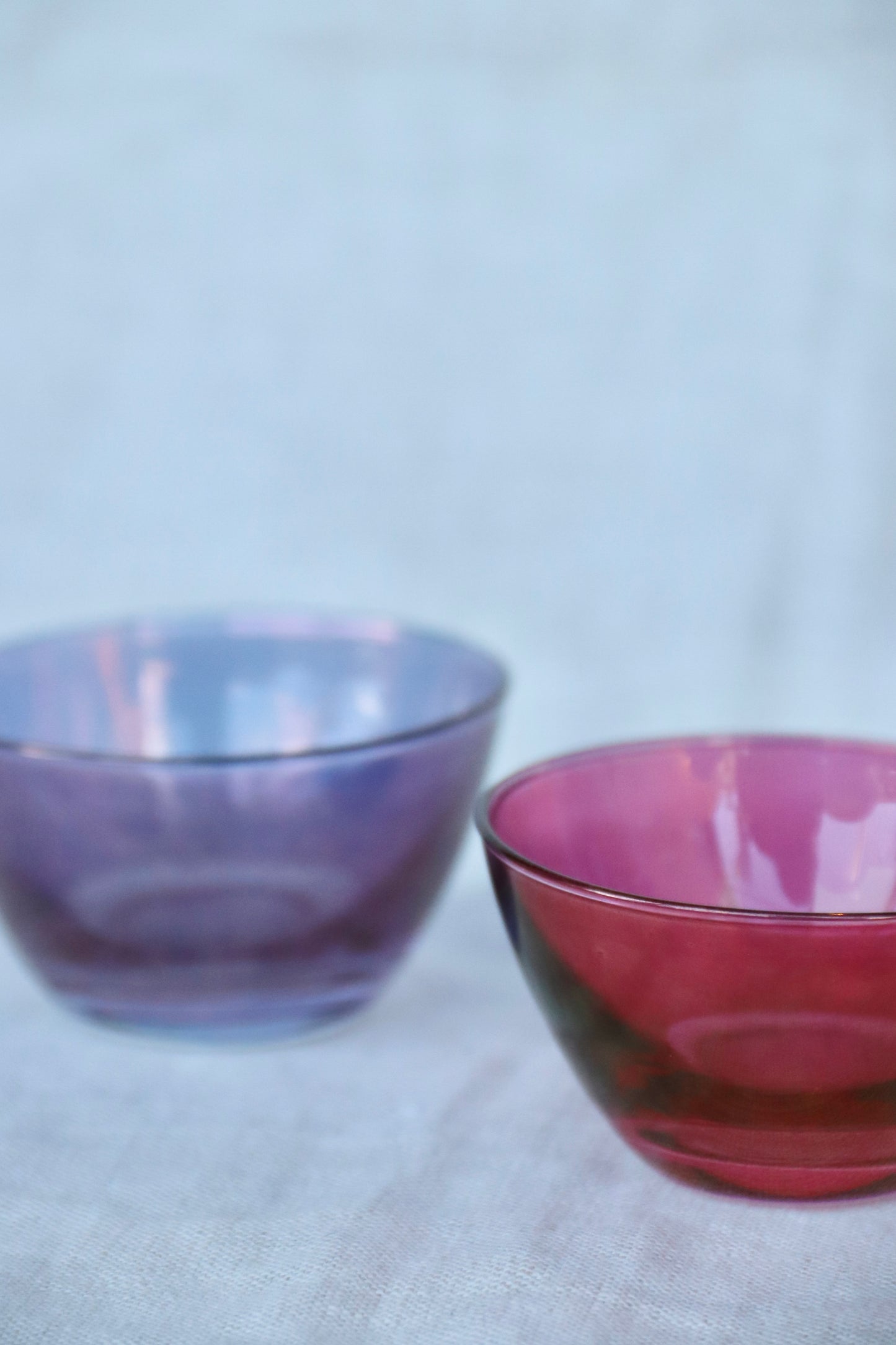 pair of mini colored glass bowls