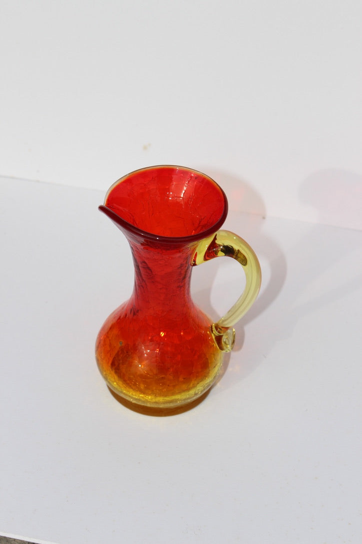Crackle red and orange vase with handle