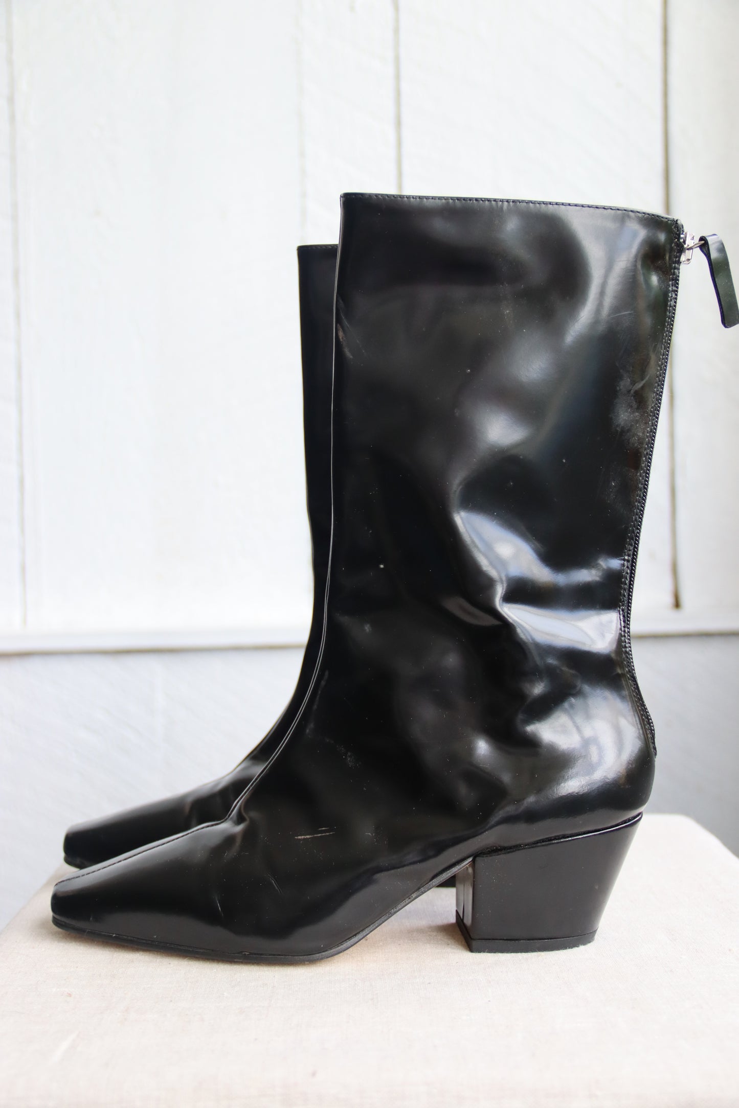 About Arianne Black Patent Leather Boots