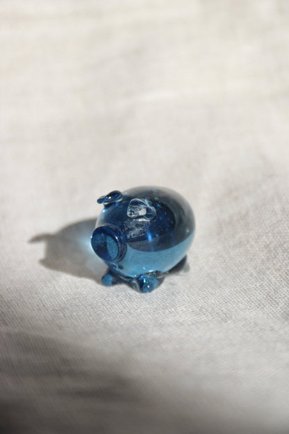 Miniature blue glass pig