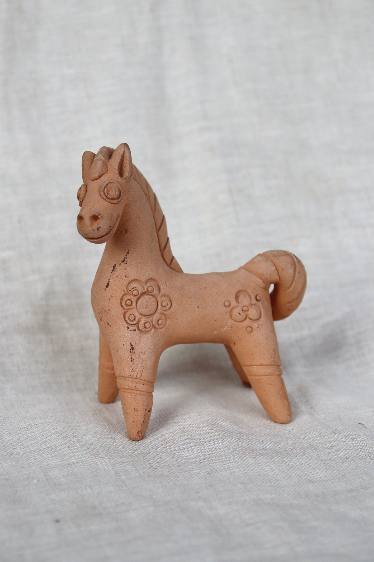 handcrafted traditional folk art style unglazed terracotta horse figurine