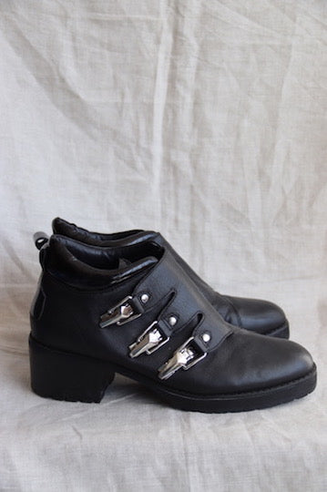 E8 by Miista black heeled boots