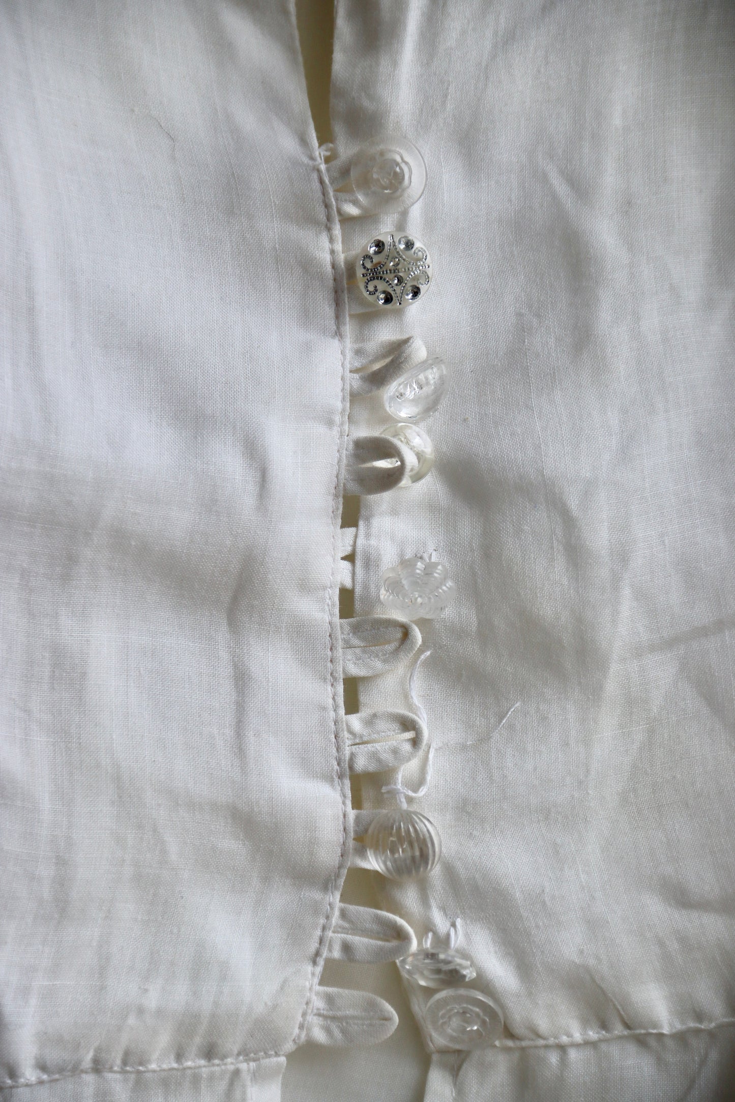 White Top with Mismatched Buttons