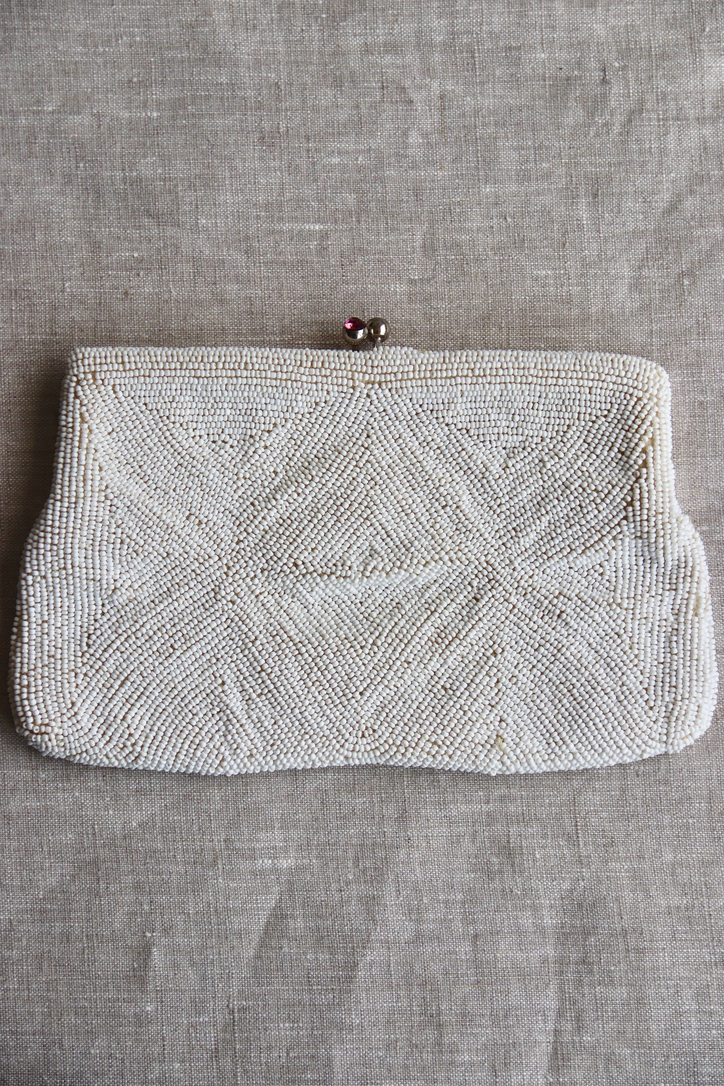 White Beaded Kisslock Clutch with Pink Rhinestones