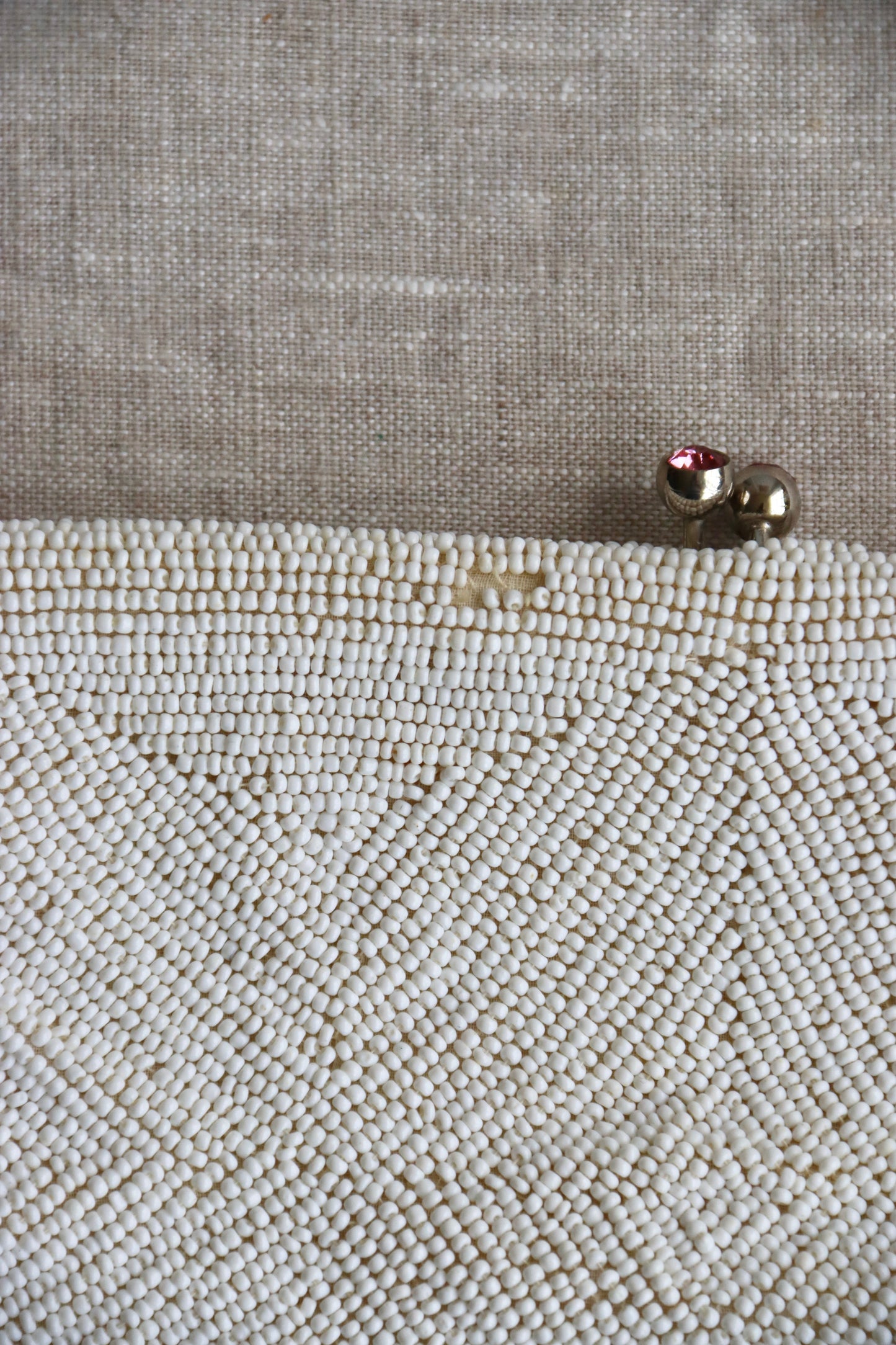 White Beaded Kisslock Clutch with Pink Rhinestones