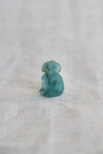 Miniature blue glass dog with broken nose