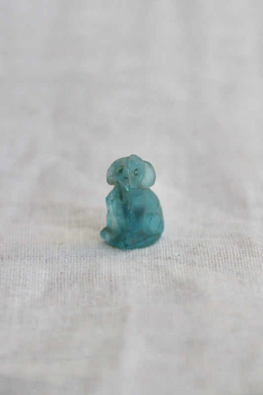 Miniature blue glass dog with broken nose