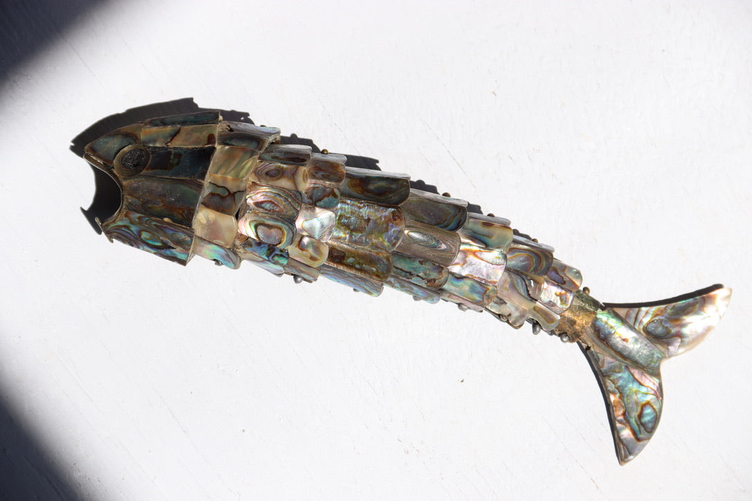 articulated alabaster fish bottle opener