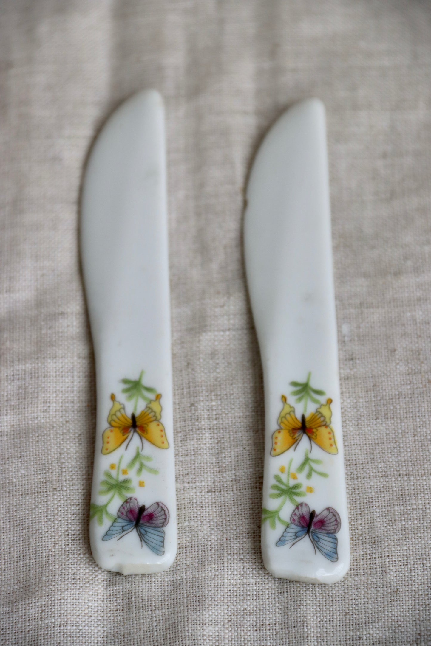 Set of Two Ceramic Butterfly Cheese Knives - as is