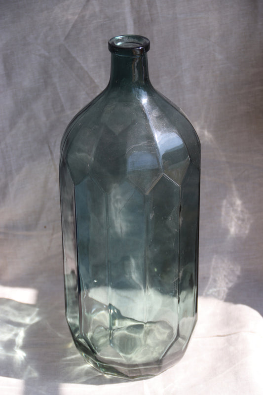 Large Faceted Glass Bottle