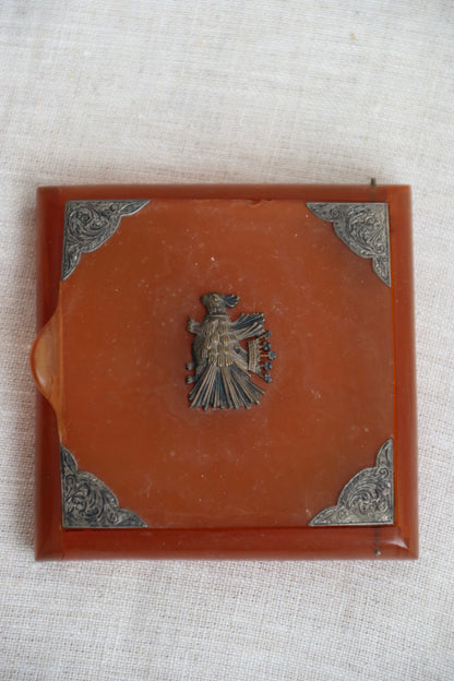 amber-colored Bakelite box