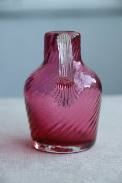 Mini hand blown maroon glass pitcher/vase