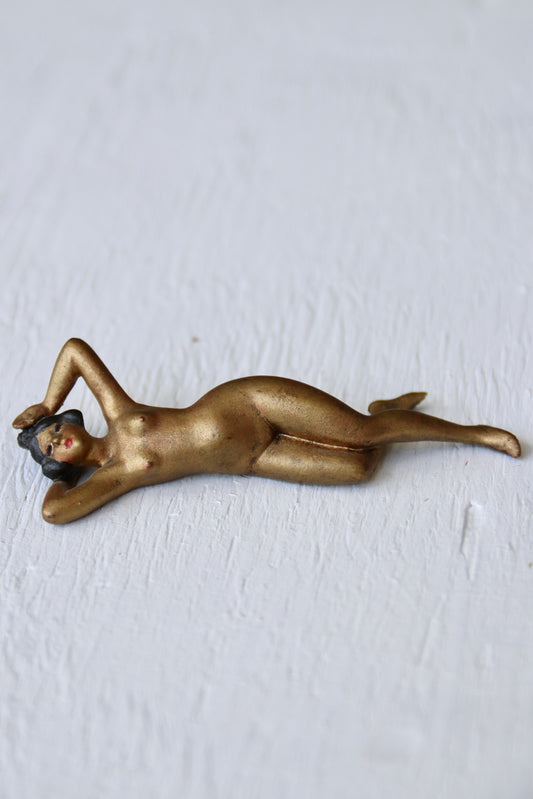 Mini reclining female figure sculpture
