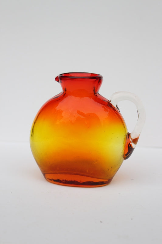 Hand Blown red and orange vase with handle